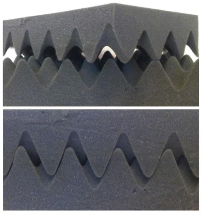 Interlocking foam structures demonstrating vanishing large friction for desynchronized atomic planes.