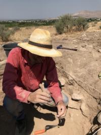 Dr. Cobb Excavates and Examines a Bone