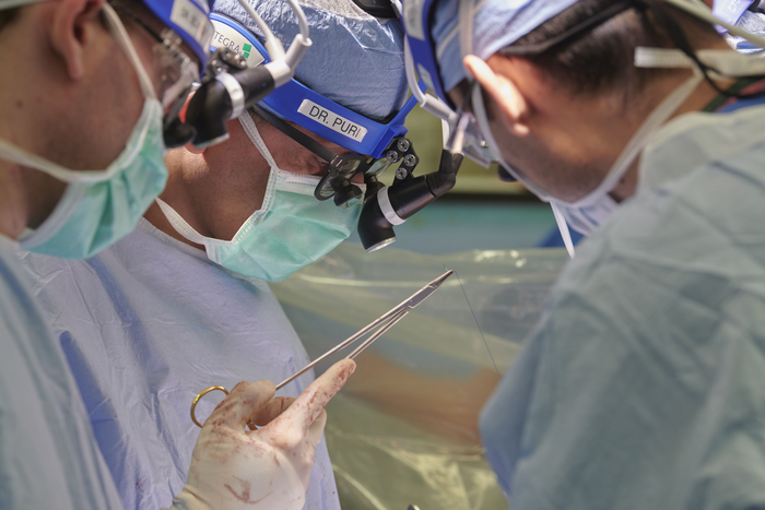 Lung transplant surgeons performing operation