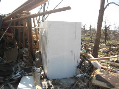 Tornado Shelter Standing Among Ruins