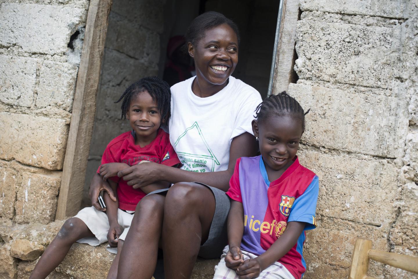 Ketcia, a Community Health Worker, during a PEPFAR-sponsored Home Health Care Visit in Haiti