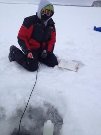 Taking Water Samples for a Yukon River Permafrost Study