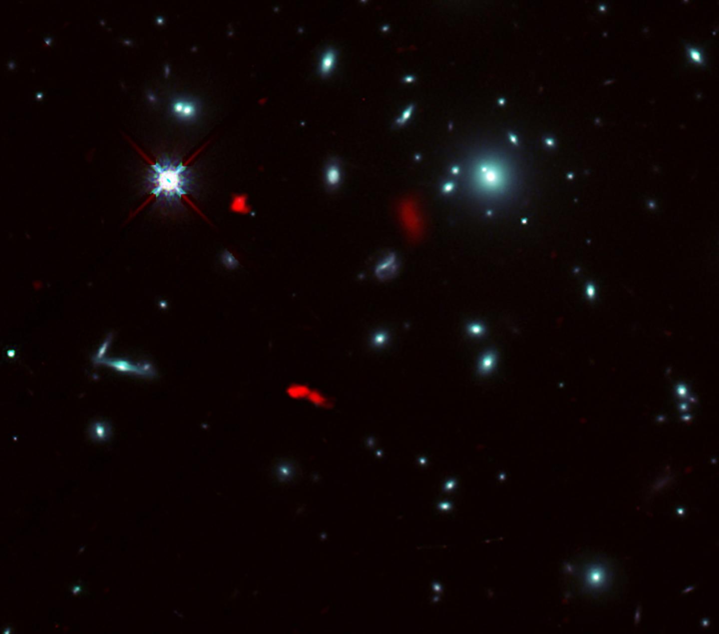 Image of the galaxy cluster RXCJ0600-2007 and the distant galaxy RXCJ0600-z6
