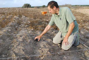 Lead author of the study Brett Kaufman prepping excavations of an ancient industrial facility