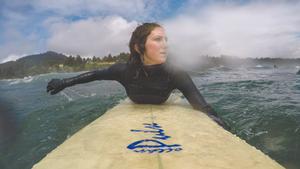 Surfer off the Oregon coast