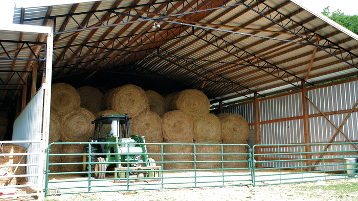 Hay barn and tractor