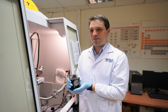 Asst Prof Canepa loading one NASICON sample in the X-ray diffractometer