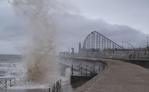 Waves topping over sea wall in Blackpool