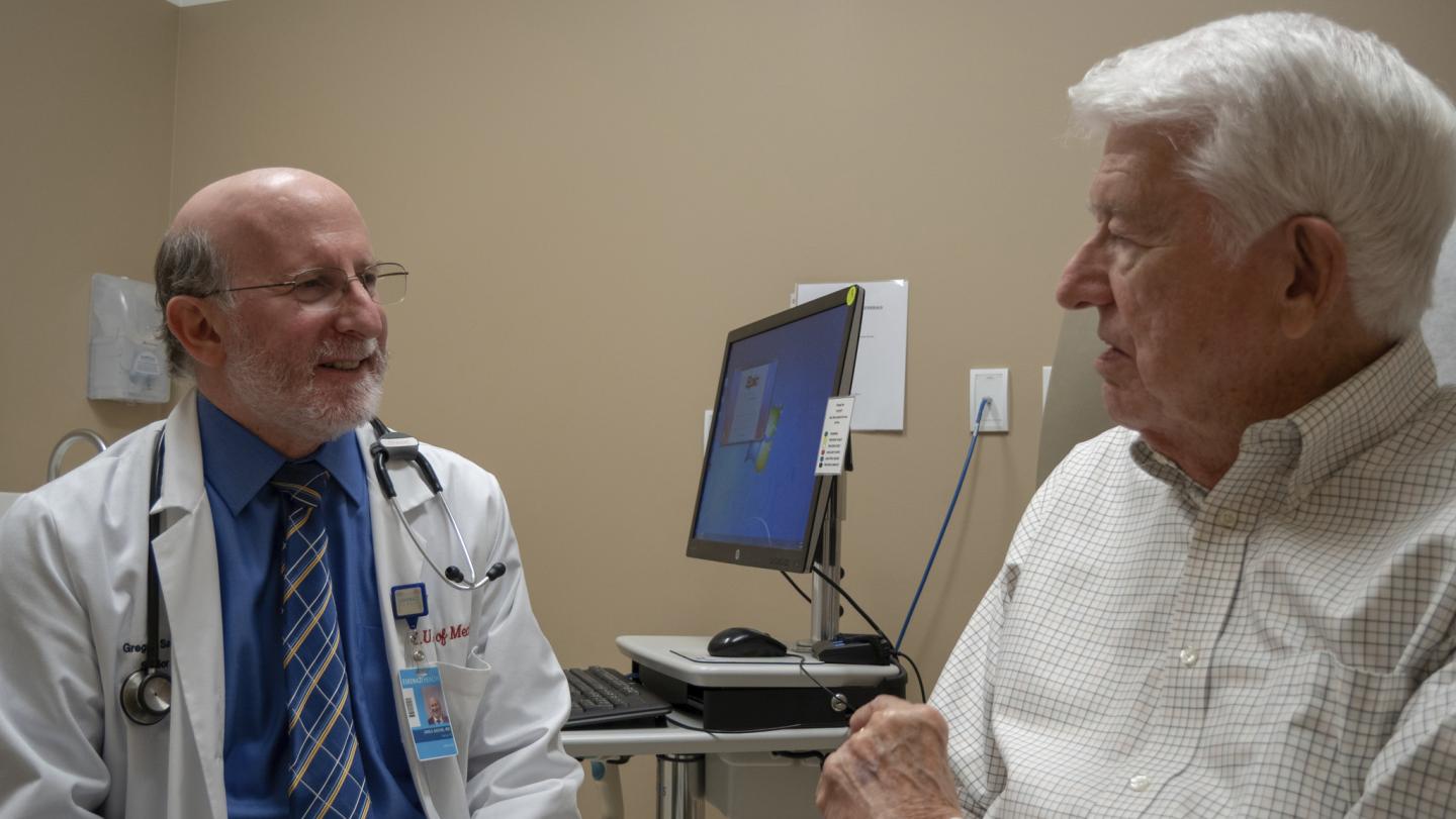 Regenstrief Institute Investigator Greg Sachs, MD with a Patient