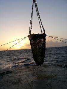 A metal dredge basket used to recover rock samples