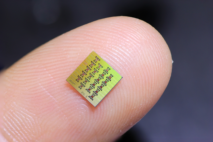 A fabricated piezoMEMS-silicon nitride chips containing multiple optical isolators.