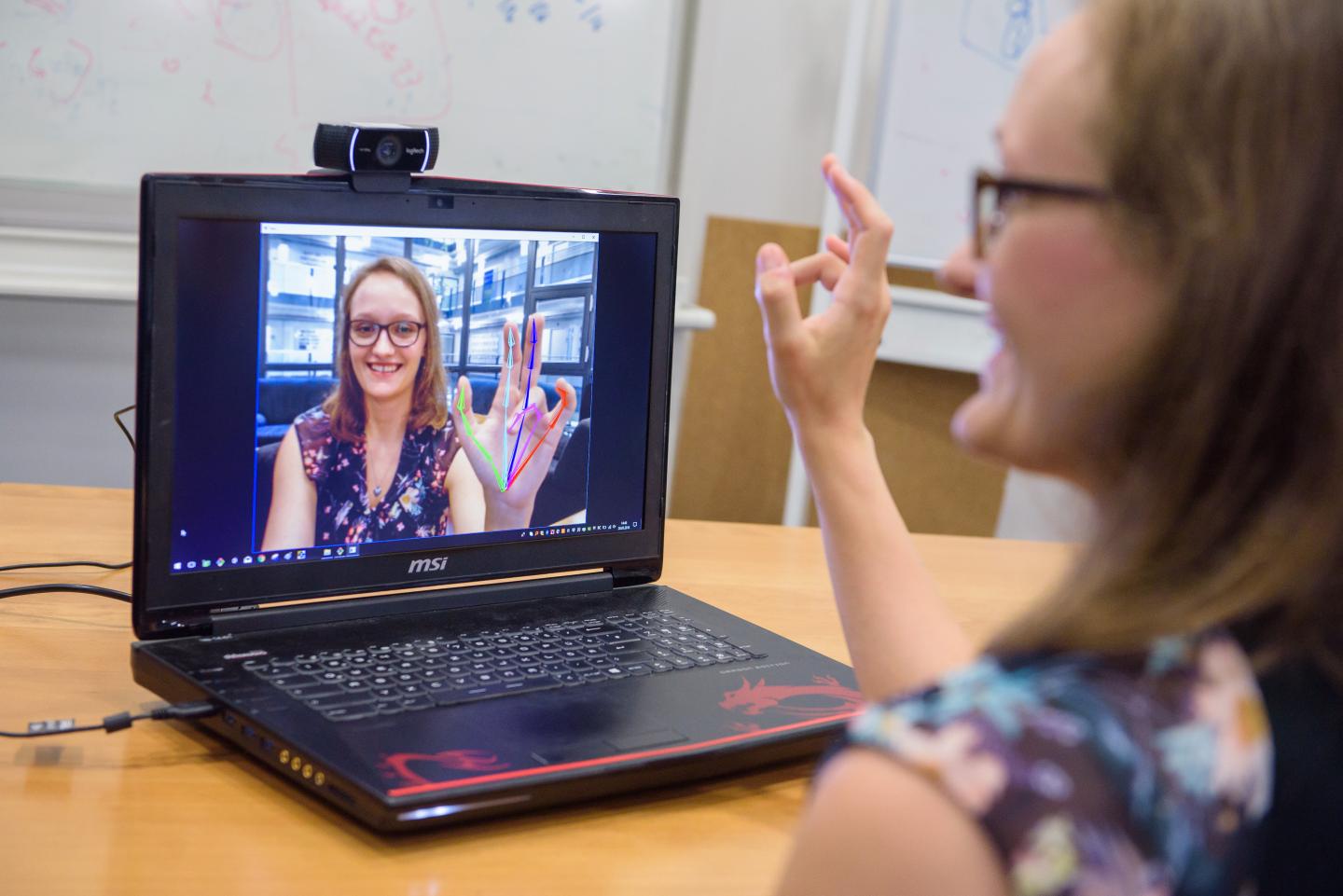 A Webcam Is Enough to Produce a Real-Time 3-D Model of a Moving Hand