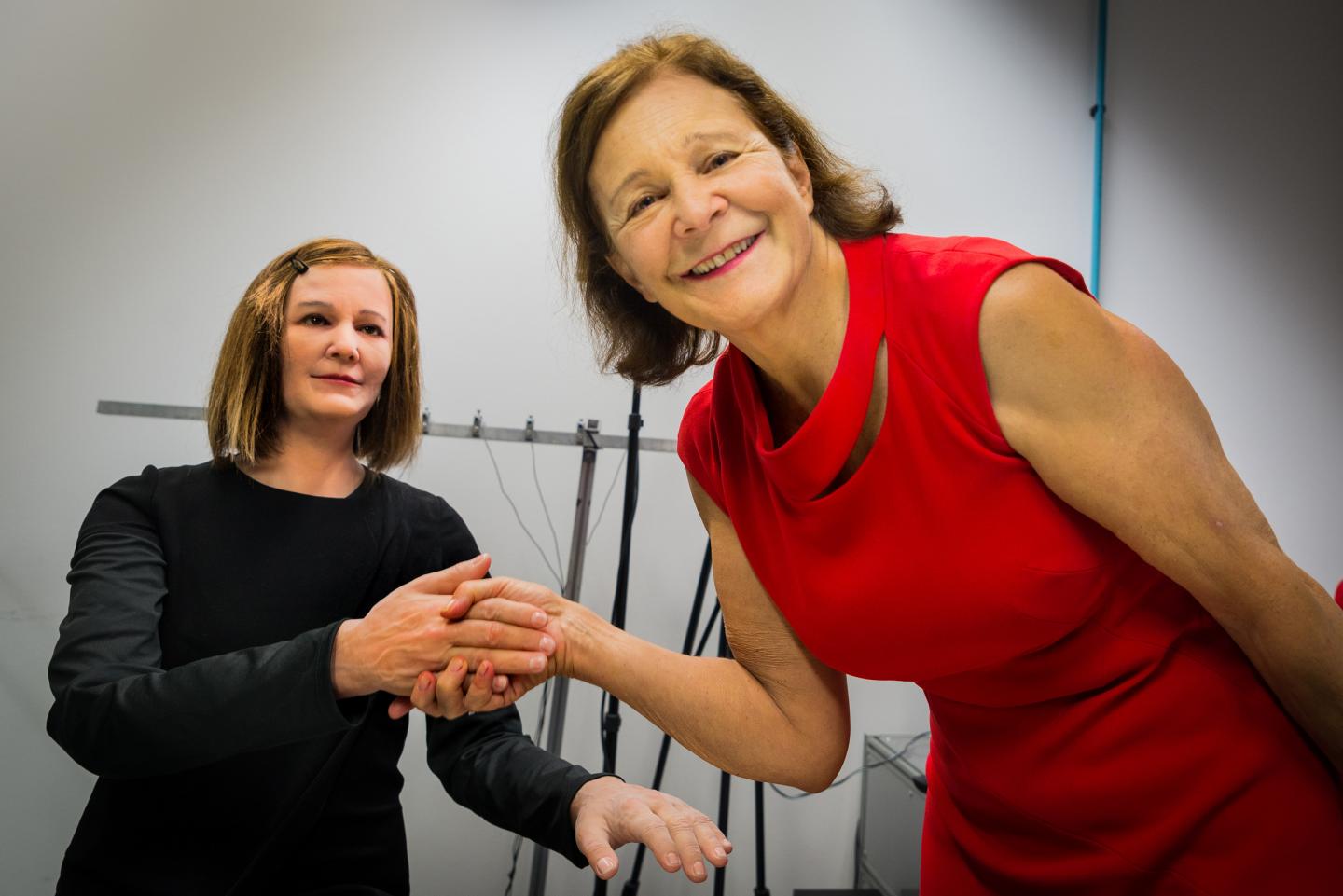 Nadia Thalmann (Right) Shaking Hands With Nadine