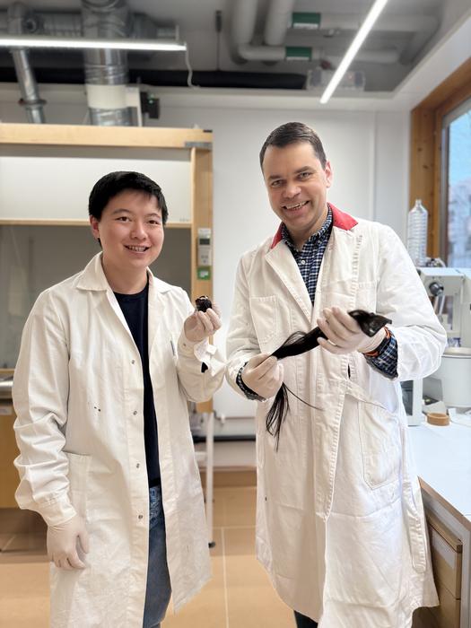 Two of the researchers with the lignin hair conditioner