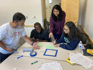 Teachers in the Rice University-based Applied Mathematics Program work through a lesson