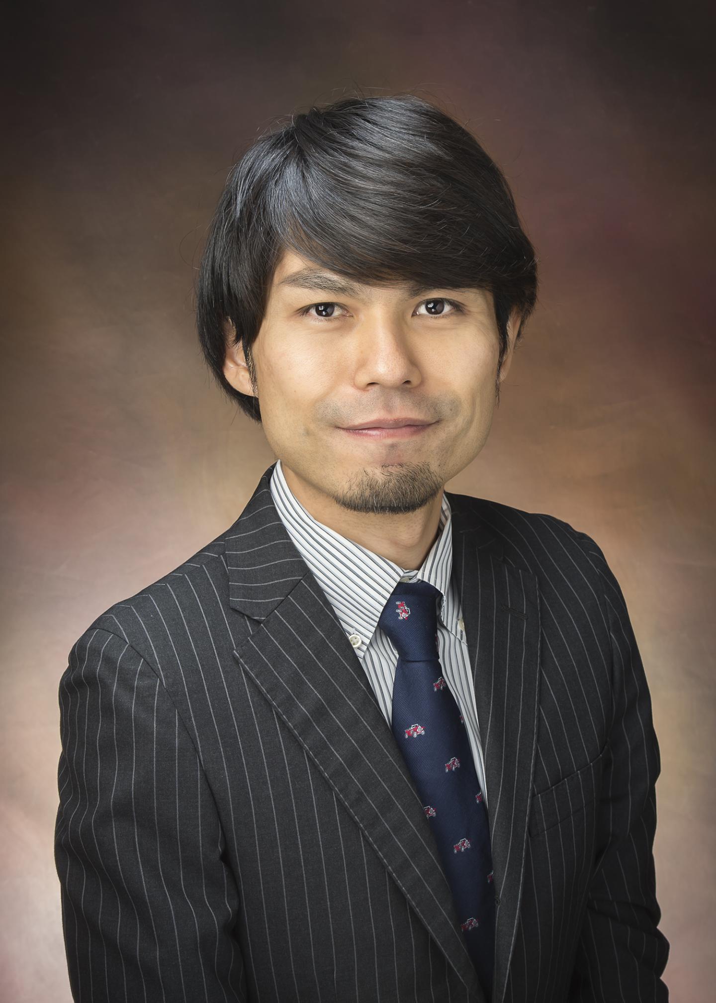 Dr. Kosuke Izumi