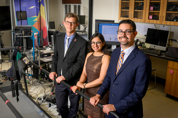 Researchers in laboratory.