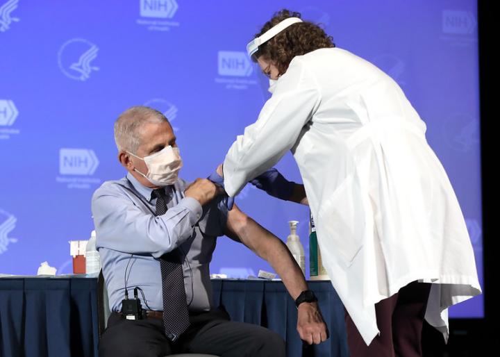 Dr. Fauci receives a vaccine.