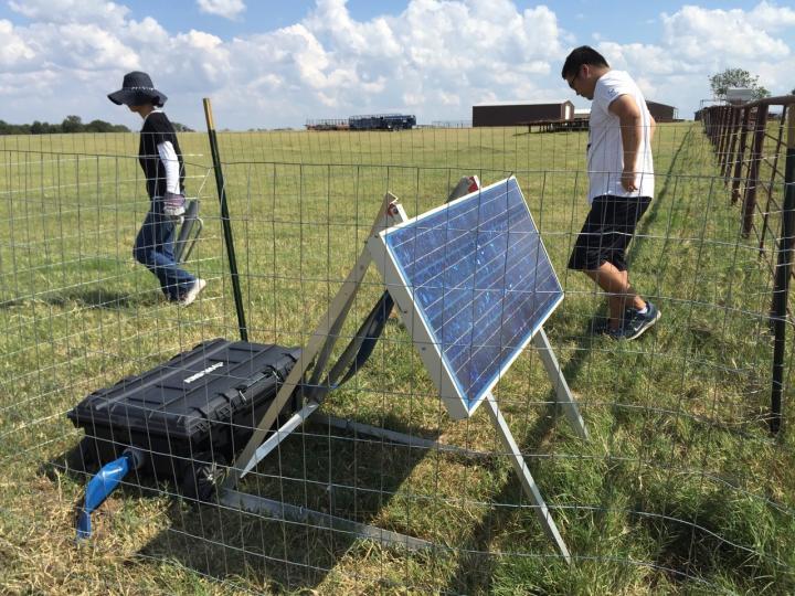 OU Geophysics Professor Xiaowei Chen in the field