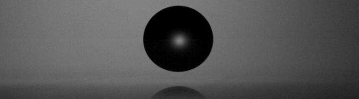 Water Droplet Hitting a Surface Covered with Glaco (A Superhydrophobic Coating)