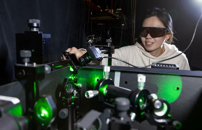 Dr. Genghua Yan at HDR photoluminescence measuring station