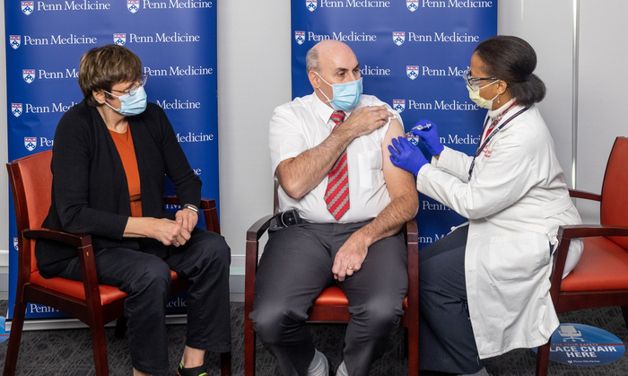 Katalin Karikó and Drew Weissman receiving a dose of the COVID-19 vaccine they helped to create