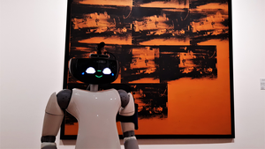 R1 humanoid robot close to Andy Warhol’s “Orange car crash”