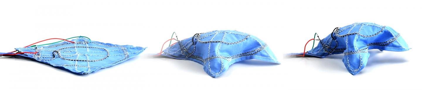 A fabric robot that can stand up, stiffen to support loads, and soften to change shape or return to flat